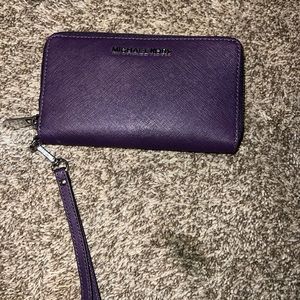 Michael Kors lightly used plum wristlet